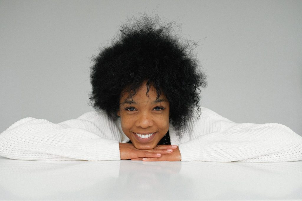 photo of woman with coily hair