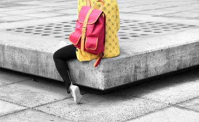 photo of woman with pink backpack