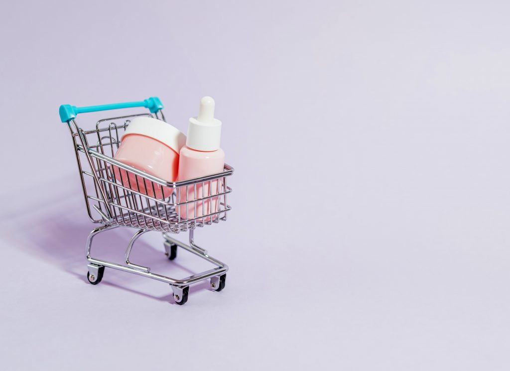 tiny shopping cart with little bottles