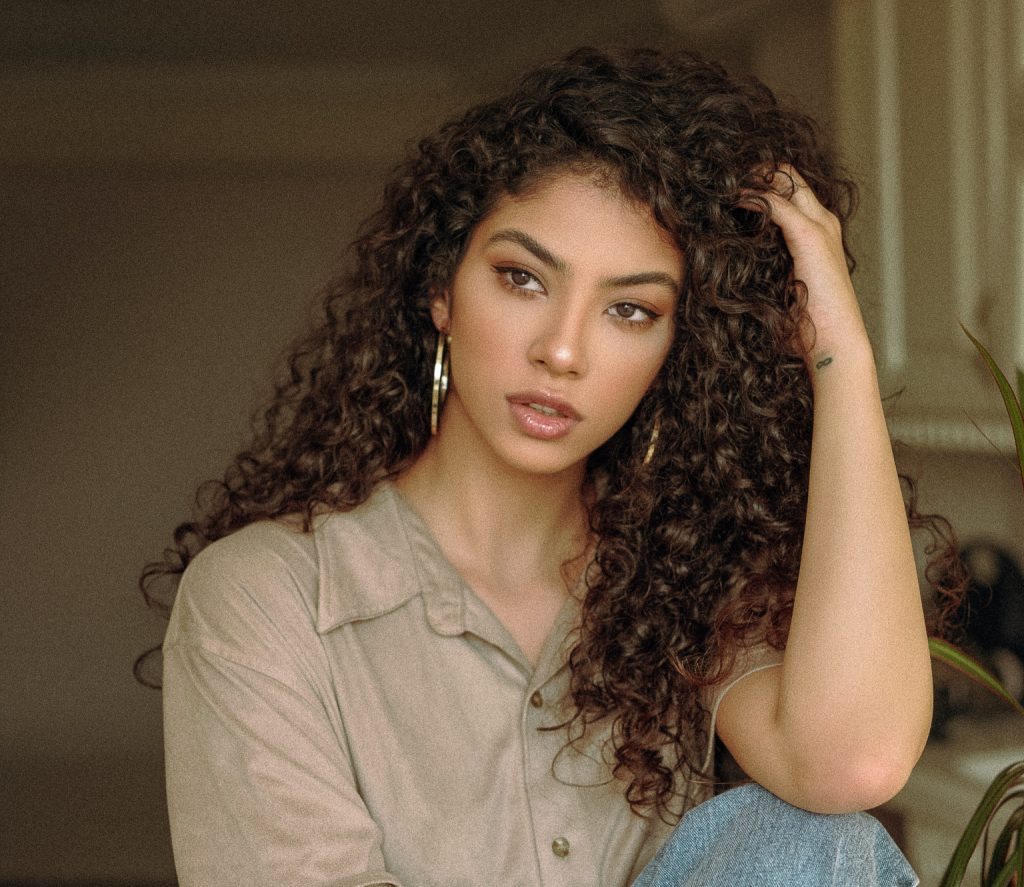 photo of woman with curly hair